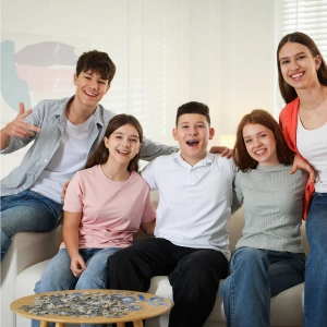 Happy family sitting together smiling and bonding at home